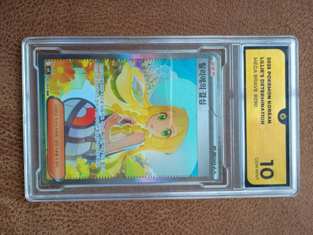 Lillie's Determination Global Grading 10 + map met hits, Ophalen of Verzenden, Zo goed als nieuw, Meerdere kaarten, Foil