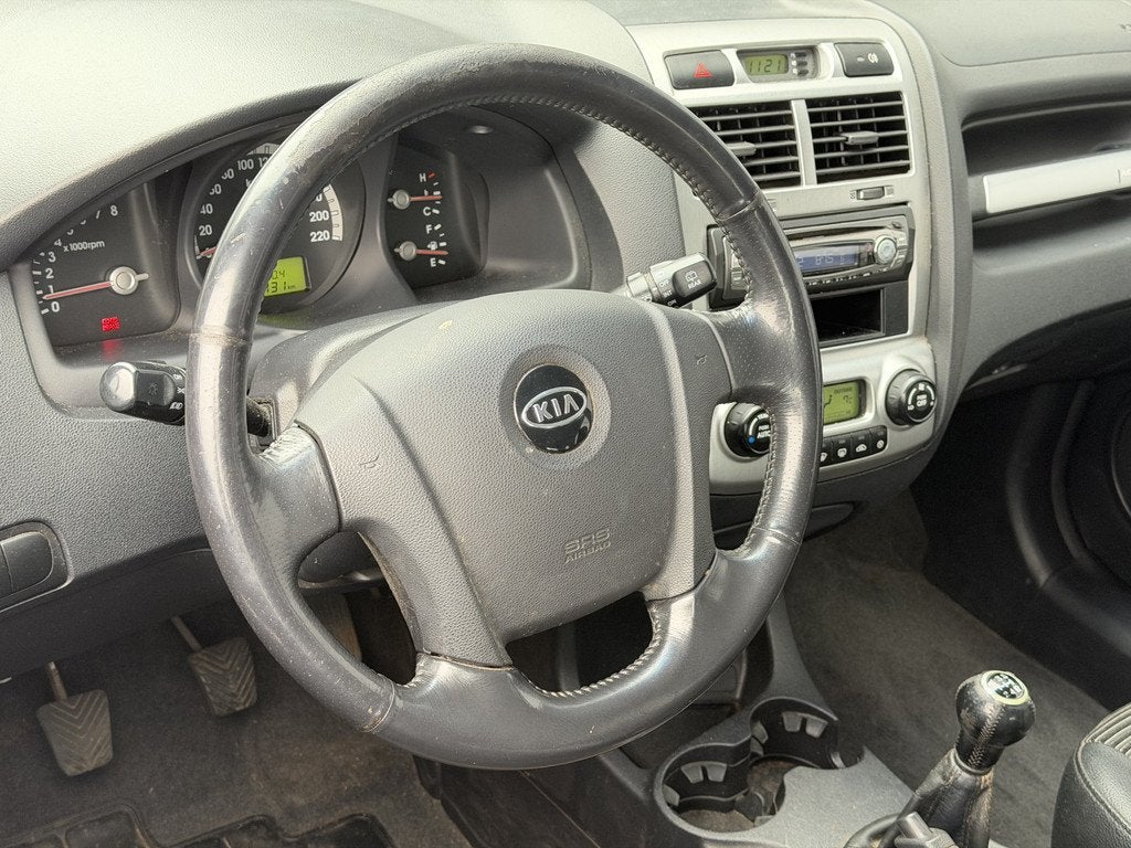 Kia Sportage 2.0 CVVT X-ecutive | Apk tot 23-03-2027 | Cruis, Auto's, Kia, 1442 kg, Stof, Gebruikt, Zwart