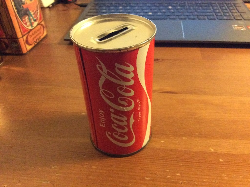 Coca Cola spaarpot Blikje. 12 cm hoog, Ophalen of Verzenden, Gebruikt, Metaal of Blik, Overige thema's