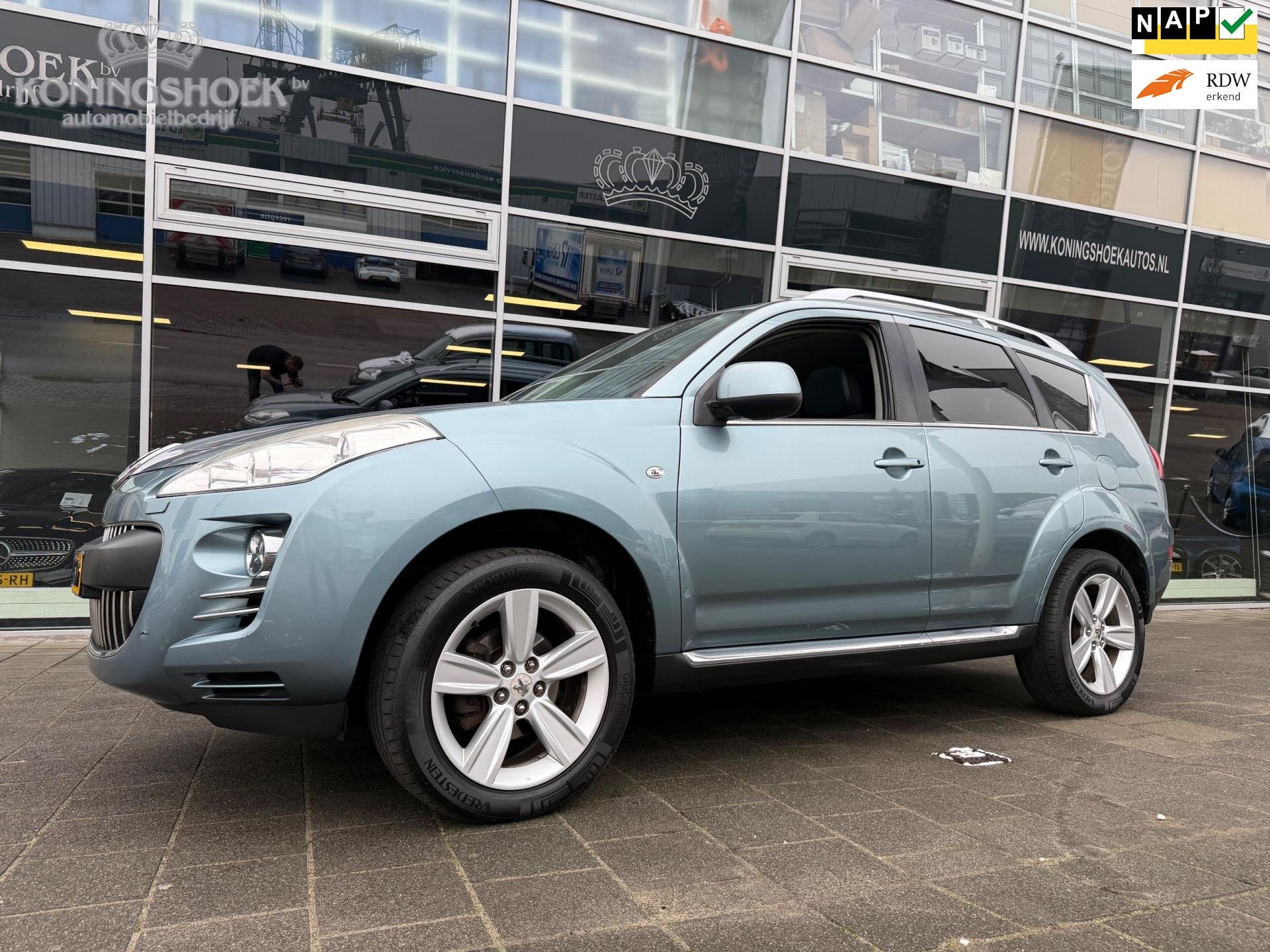 Peugeot 4007 2.4 GT 7p Automaat, Auto's, Peugeot, Automaat, Gebruikt, Zwart, 4 cilinders