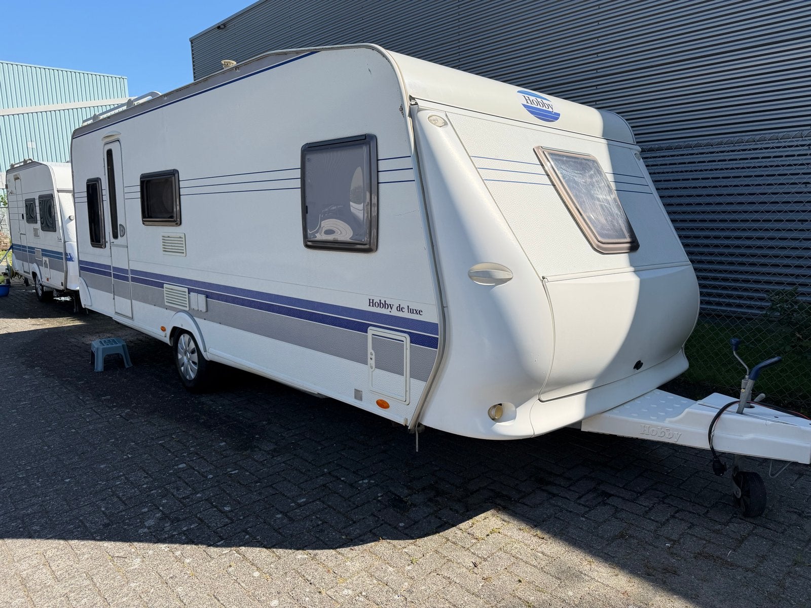 Hobby 560 KMFE met Isabella voortent - 6 persoons, Caravans en Kamperen, Stapelbed, Rondzit, Hobby, Bedrijf