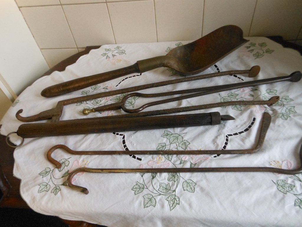 oud ijzere en koperen kachel gereedschap, Ophalen