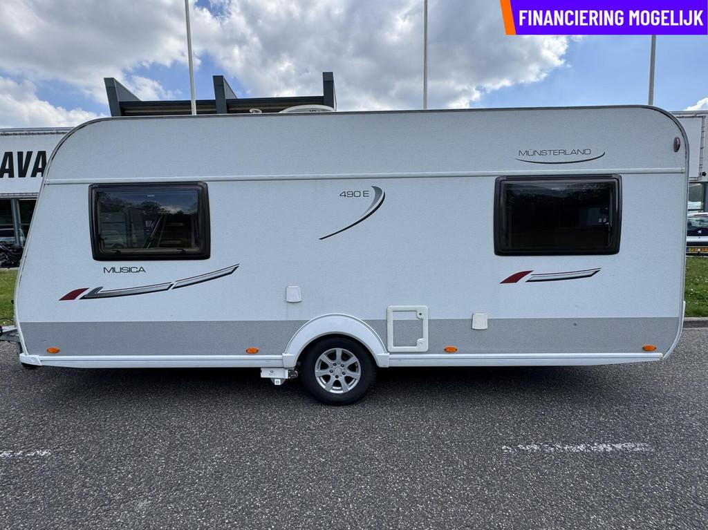 LMC MUNSTERLAND MUSICA 490 E MOVER + LUIFEL + SCHOTEL + TV, Caravans en Kamperen, Caravans, Rondzit, 7 tot 8 meter, Bedrijf, Hordeur