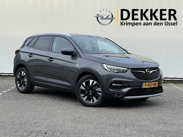 Opel Grandland X 1.2 Turbo Elegance Automaat met Navi/Camera, Auto's, Opel, 12 maanden, Gebruikt, 1199 cc, Leder en Stof