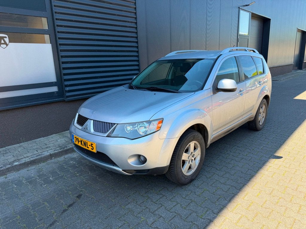 Mitsubishi Outlander 2.4 Intro Edition 2WD airco export prij, Auto's, Mitsubishi, Bedrijf, Te koop, Outlander, ABS, Airbags, Airconditioning