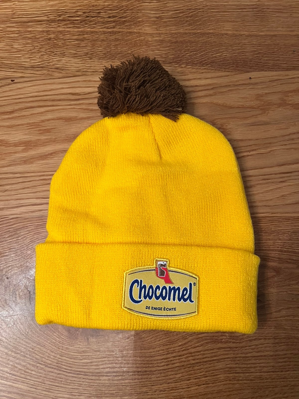 Nieuwe gele Chocomel Muts, Ophalen of Verzenden, Nieuw, Overige maten, Muts