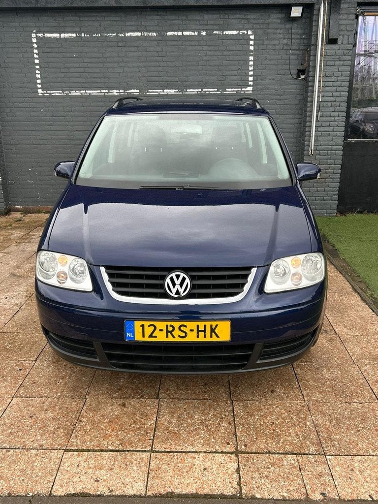 Volkswagen Touran 1.6-16V FSI Trendline, Gebruikt, 4 cilinders, Blauw, Origineel Nederlands