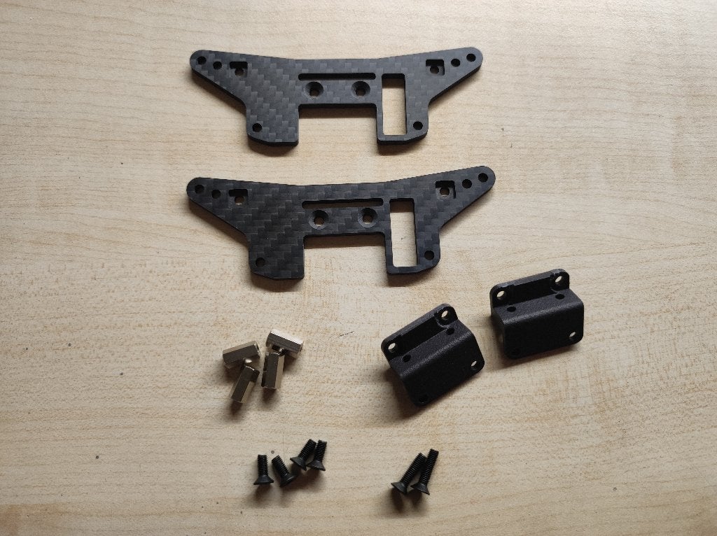 Nieuwe Tamiya TA03 Carbon Damper Mounts, Elektro, Nieuw, Ophalen of Verzenden, Onderdeel