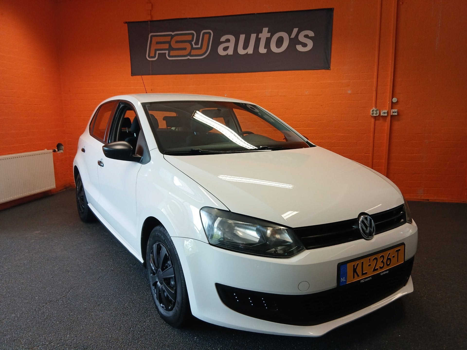 Volkswagen Polo 1.2 12V / 5 DEURS / SPORTLINE / AIRCO!, Voorwielaandrijving, Euro 5, 1198 cc, Wit