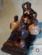 Chulucana uit Peru. Familie O vrouw + 3 kinderen met oven, Ophalen