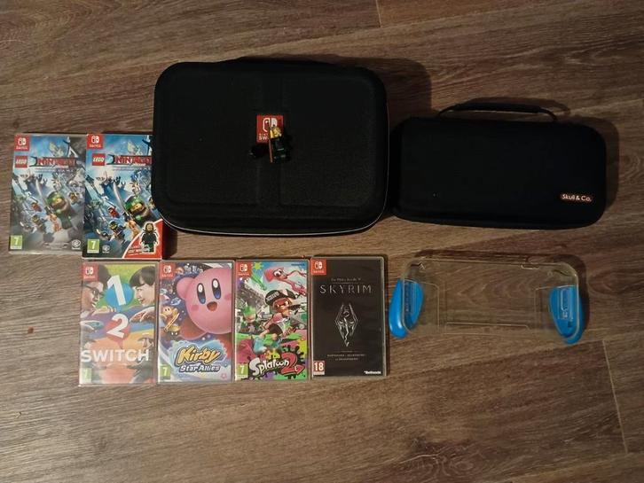 Nintendo Switch Travel Case + Spellen, Spelcomputers en Games, Games | Nintendo Switch, Gebruikt, Avontuur en Actie, 1 speler