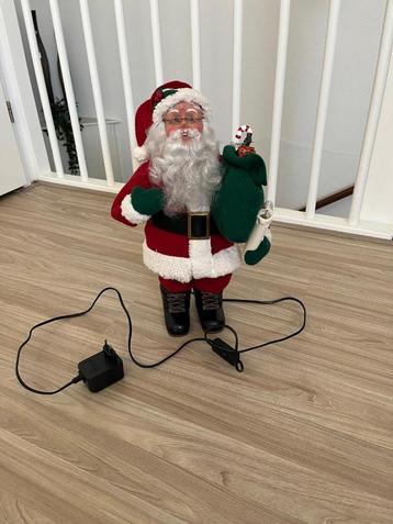 Bewegende kerstman met lampje beschikbaar voor biedingen