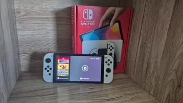 Witte Nintendo Switch OLED + Pro Controller  beschikbaar voor biedingen