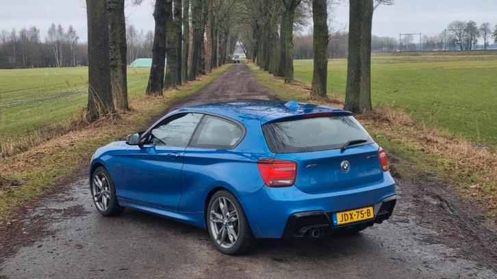 BMW M135i 3.0 3DR xDrive AUT 2014 Estoril Blauw, Auto's, BMW, Particulier, 1-Serie, Airbags, Airconditioning, Bluetooth, Boordcomputer