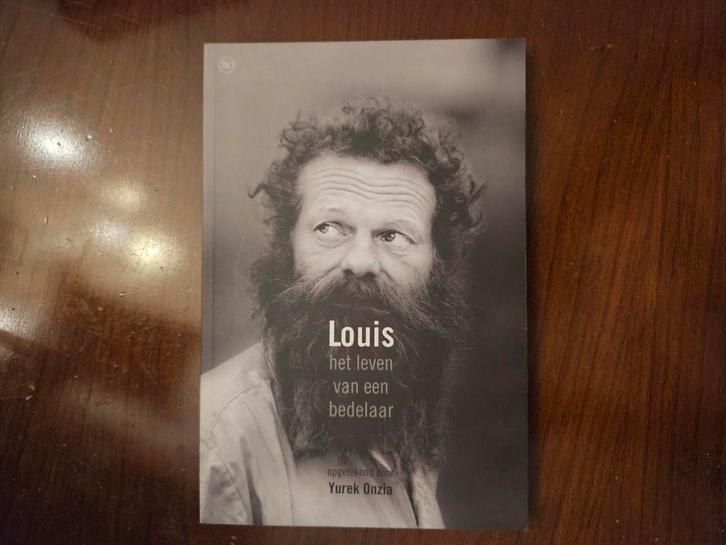 L. Onzia - Louis, het leven van een bedelaar, Boeken, Wetenschap, Zo goed als nieuw, Ophalen of Verzenden
