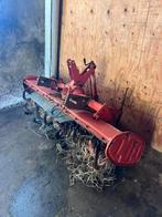 Kubota grondfrees, Ophalen