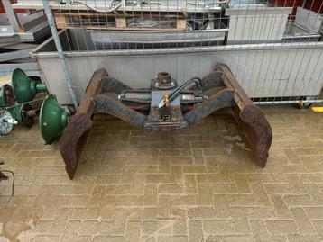 Graafbak met dichte schalen beschikbaar voor biedingen