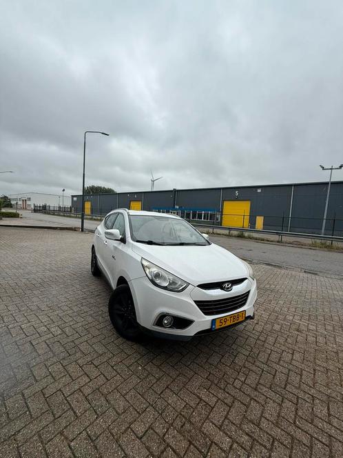 Hyundai iX35 1.6i GDI Blue 135pk 2012 Wit, Auto's, Hyundai, iX35, Achteruitrijcamera, Airconditioning, Bluetooth, Centrale vergrendeling