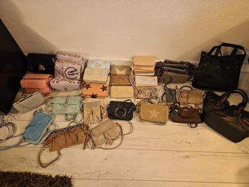 Portemonnee’s en tasjes beschikbaar voor biedingen