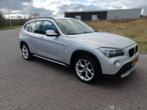 BMW X1 2.0 D Xdrive 20D AUT 2010 Grijs, Auto's, BMW, Euro 5, 1995 cc, Zwart, 2000 kg
