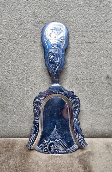 Antiek zilveren theeschepje beschikbaar voor biedingen