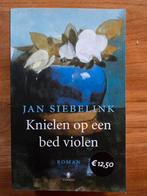 Knielen op een bed violen - Jan Siebelink, Ophalen of Verzenden