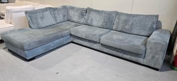 Lichtblauwe ribstof hoekbank met losse kussens beschikbaar voor biedingen