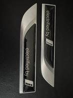 Originele BMW electrified by i badge 2x voor de G reeks, Voor, Nieuw, Ophalen of Verzenden, Bumper