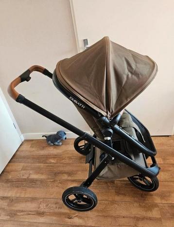 Dubatti groen kinderwagen beschikbaar voor biedingen
