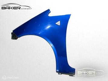 Spatbord links blauw Mitsubishi Colt VI  ('04-'13) beschikbaar voor biedingen