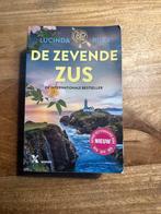 De Zevende Zus - Lucinda Riley, Boeken, Ophalen of Verzenden, Zo goed als nieuw, Nederland