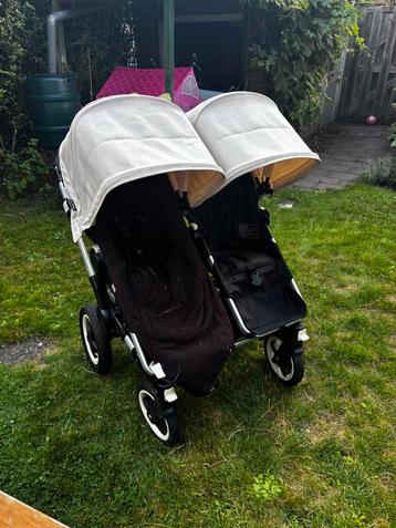 Bugaboo duo donkey, met 2 zitjes en reiswiegje beschikbaar voor biedingen