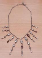 Ketting van staal met "koffieboontjes" zilver met bruin nw, Ophalen of Verzenden, Nieuw, Zilver, Overige materialen