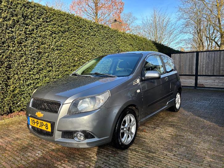 Chevrolet Aveo 1.2 16V 3D 2011 Grijs, Auto's, Chevrolet, Particulier, Aveo, ABS, Airbags, Airconditioning, Alarm, Android Auto