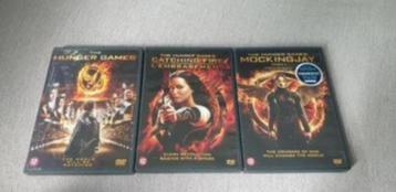 Te koop dvds The hunger games - Catching fire en mockingjay  beschikbaar voor biedingen