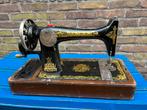 Antieke Singer Sphinx naaimachine, Ophalen