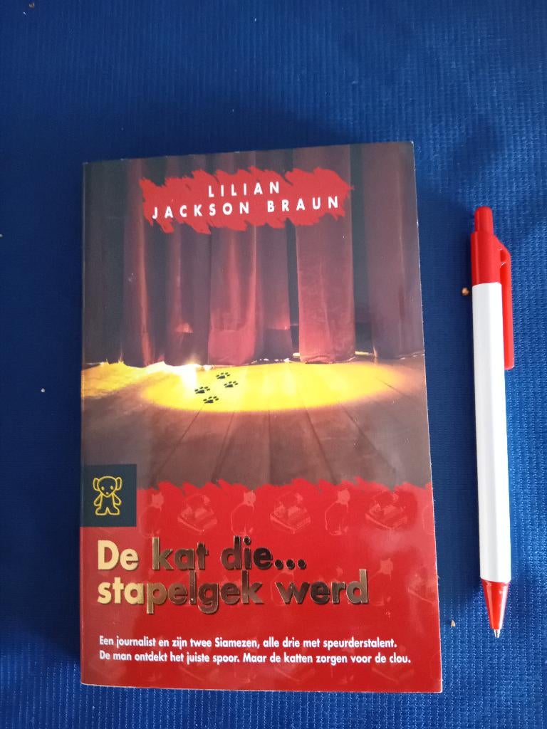 Lilian Jackson Braun. De kat die... stapelgek werd., Boeken, Detectives, Zo goed als nieuw, Ophalen of Verzenden