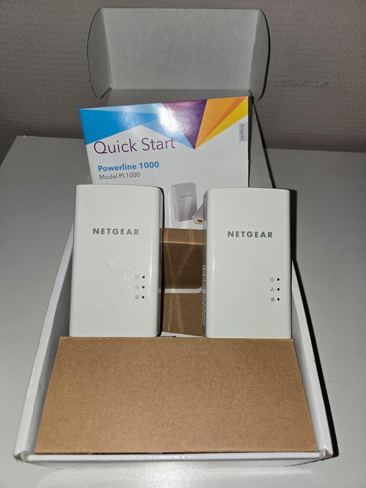 NETGEAR PL1000, Computers en Software, Netwerk switches, Nieuw, Ophalen of Verzenden