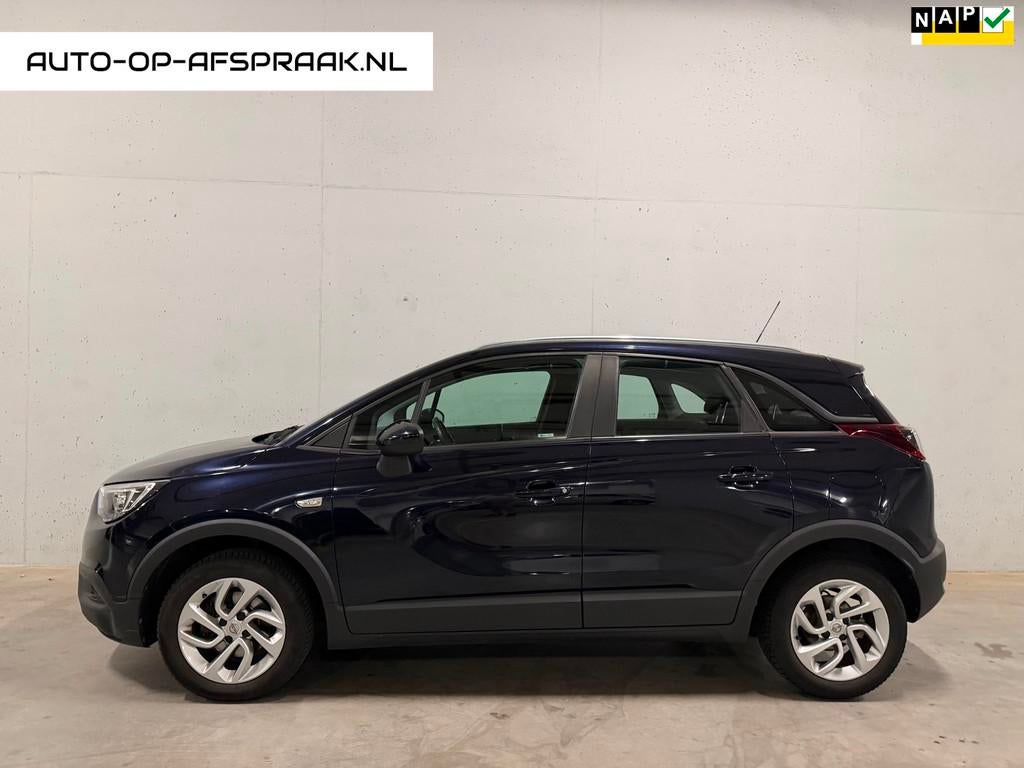 Opel Crossland X 1.2 Turbo Online Edition PDC Navi Clima Cru, Auto's, Euro 6, 1199 cc, Blauw, 49 €/maand