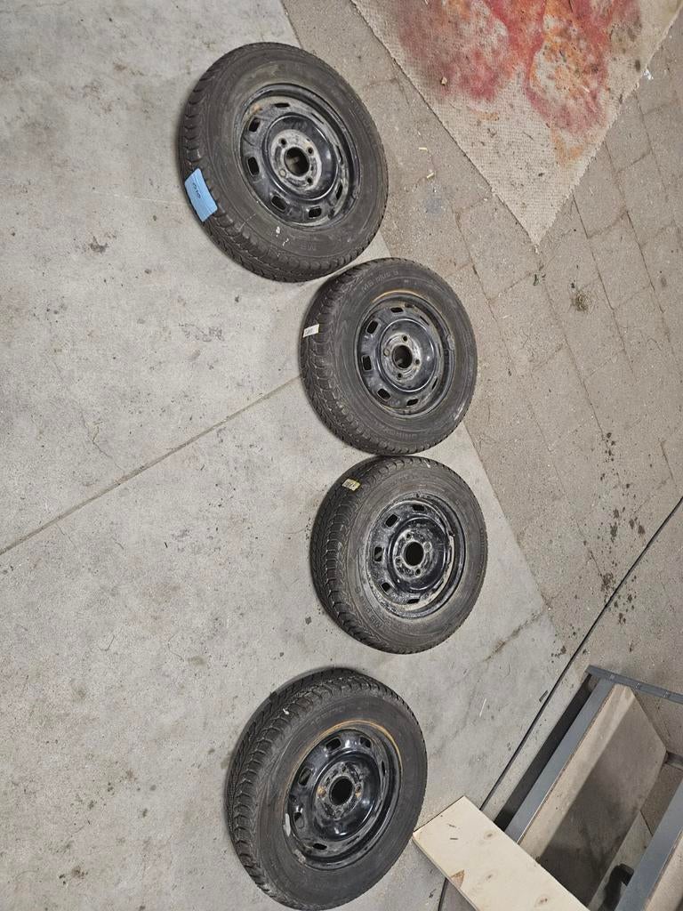 Set winterbanden 165/70 R13, Ophalen