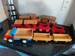 Houten speelgoed: treinen en vrachtwagen, Ophalen