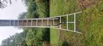 Uitschuifbare Altrex ladder, Doe-het-zelf en Verbouw, Ladders en Trappen, Ophalen of Verzenden, Gebruikt, 4 meter of meer
