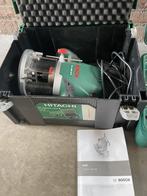 Bosch POF1400 Bovenfrees incl 2 koffers, Doe-het-zelf en Verbouw, Gereedschap | Freesmachines, Ophalen, Zo goed als nieuw, Bovenfrees