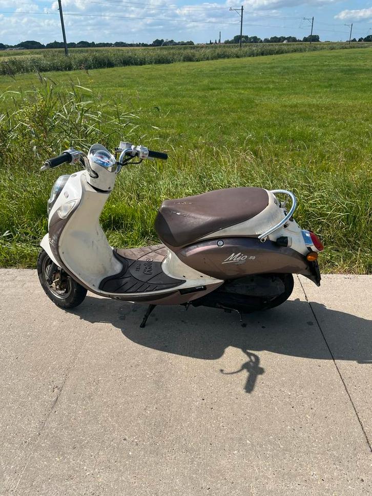 Sym Mio scooter, Fietsen en Brommers, Scooters | Yamaha, Gebruikt, Overige modellen, Maximaal 45 km/u, Benzine, Ophalen