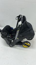 Doona kinderwagen / autostoel + base + regenhoes + opbergvak, Kinderen en Baby's, Zijbescherming, Zo goed als nieuw, Isofix, 0 t/m 13 kg