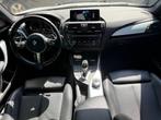 BMW 1-serie M135i xDrive High Executive l Schuifdak l Volled, Gebruikt, 320 pk, Wit, Leder