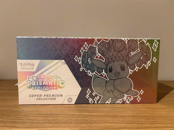 Prismatic Evolutions super premium collection, Hobby en Vrije tijd, Verzamelkaartspellen | Pokémon, Zo goed als nieuw, Ophalen of Verzenden
