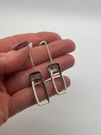 B675 Prachtige zilveren Fossil oorbellen, Hangers, Ophalen of Verzenden, X, Zilver