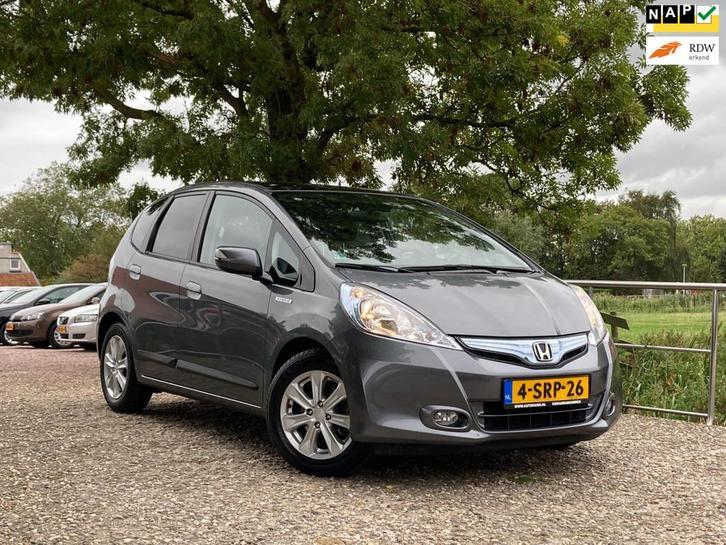 Honda Jazz 1.4 Hybrid | Leder + Stoelverw. + Clima + Cruise, Auto's, Honda, Bedrijf, Te koop, Jazz, ABS, Airbags, Airconditioning