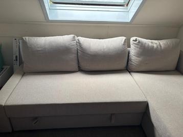 Zo goed als nieuwe Ikea hoekslaapbank met opberger beschikbaar voor biedingen